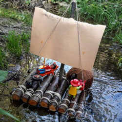 Fluss – Pirat mit Floß